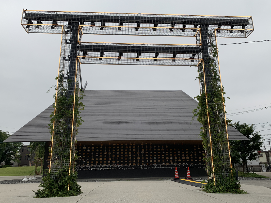 The shrine next to the Kadokawa Culture Museum, featuring a modern, LED torii gate.